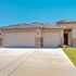 Triple garage with single and double door openings